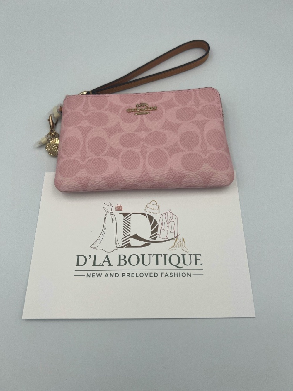 Coach Corner Zip Wristlet In Signature Canvas Powder Pink With Charms